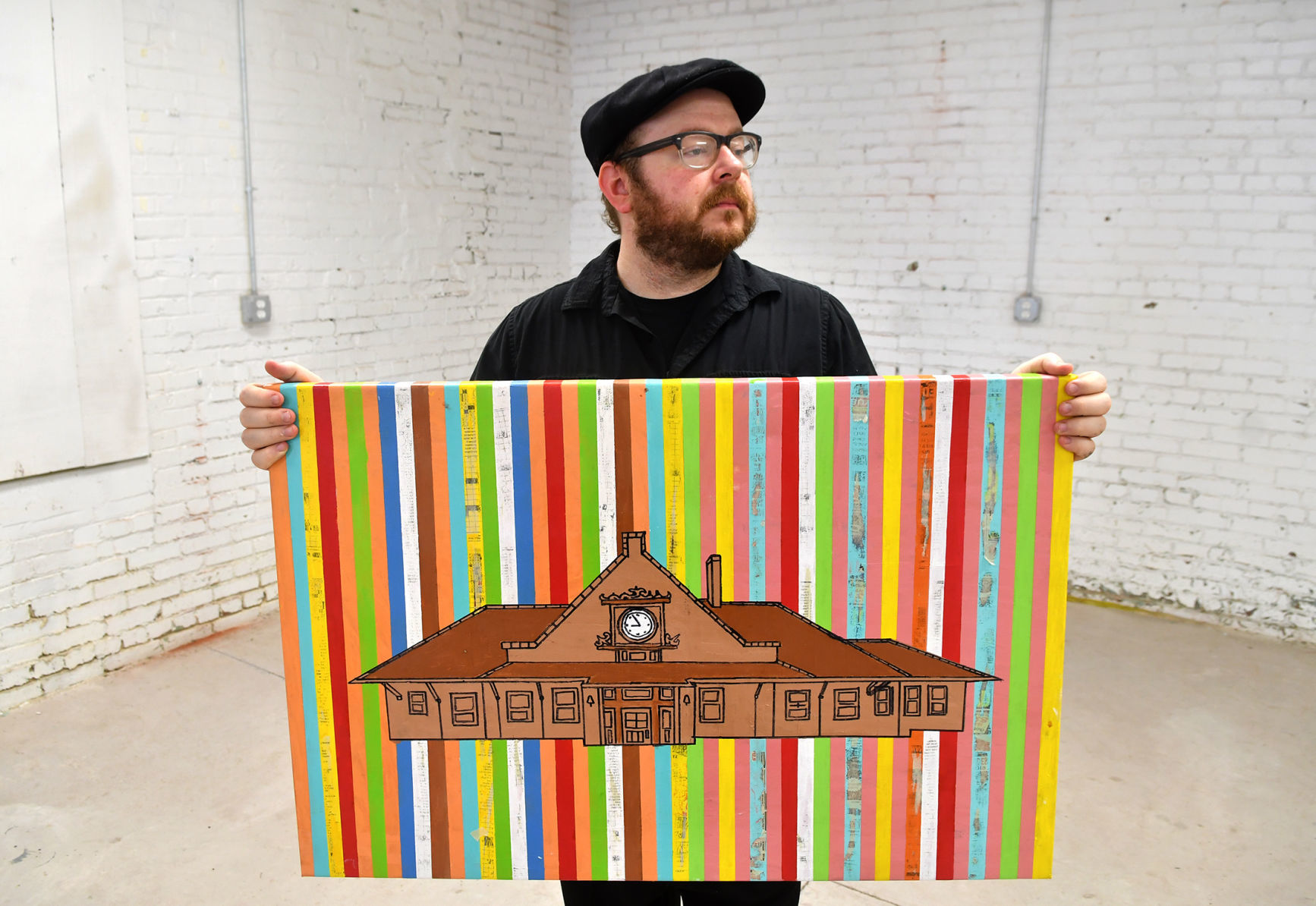 Jon Burns is opening his new art exhibit, QC Icons, on Aug. 2